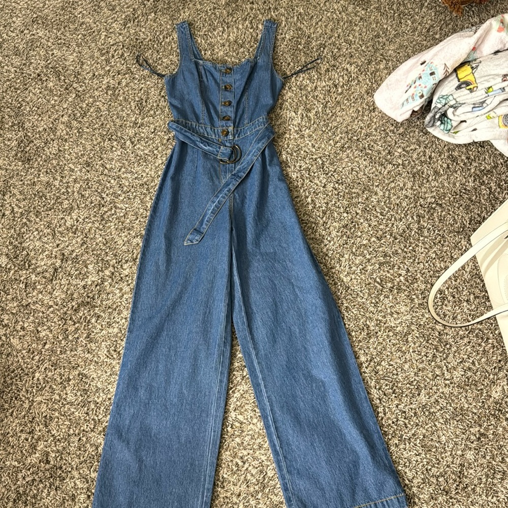 Denim jumper fitted at the top with flare jeans